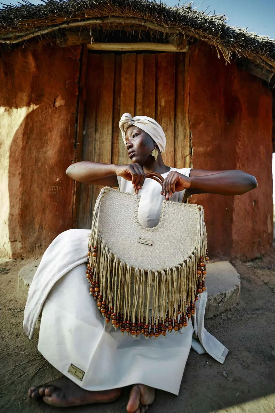 Model carrying the Beaded Fringe Open Tote